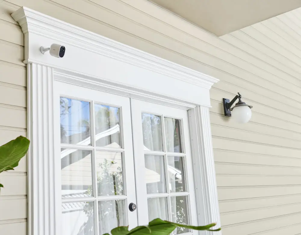 Wide-angle doorbell camera installed outside a home