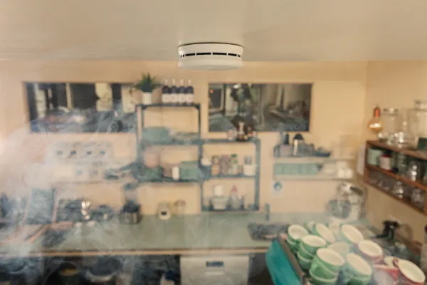 Fire alarm response in a café