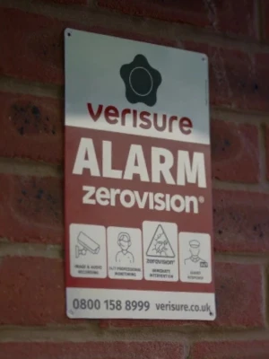 An intruder at the outside of a house at night