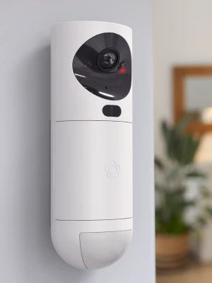 Verisure outdoor security camera mounted on a house wall