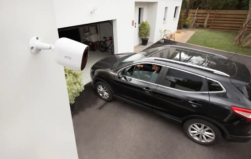 Security Cameras And Spotlight Protecting Garage