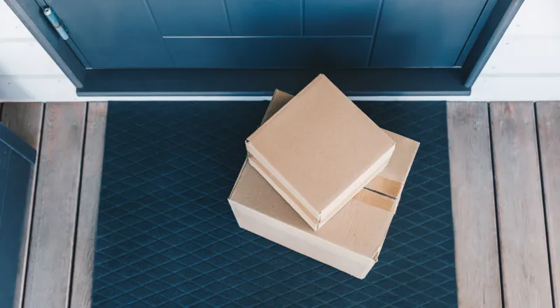 Stacked parcels on doorstep