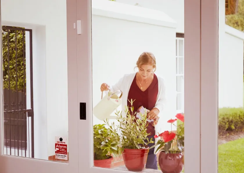 Window and door vibration sensor installed in a home